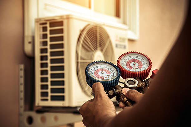Professional Hvac technician working in Essex, MA